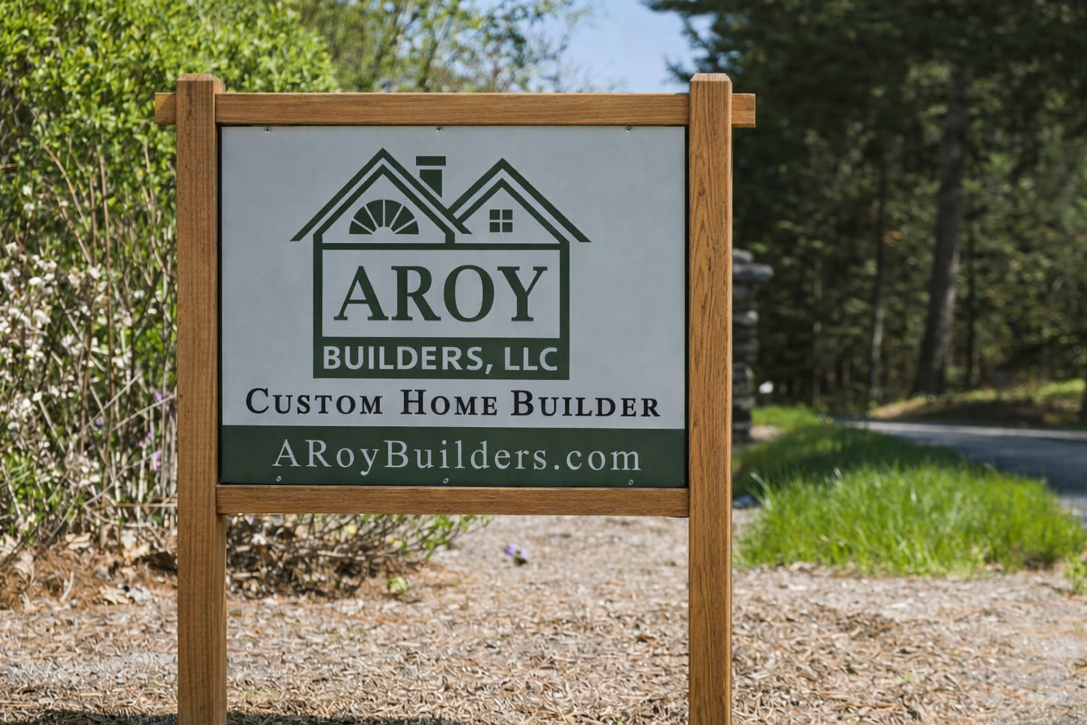 ARoy Builders yard sign in wood frame
